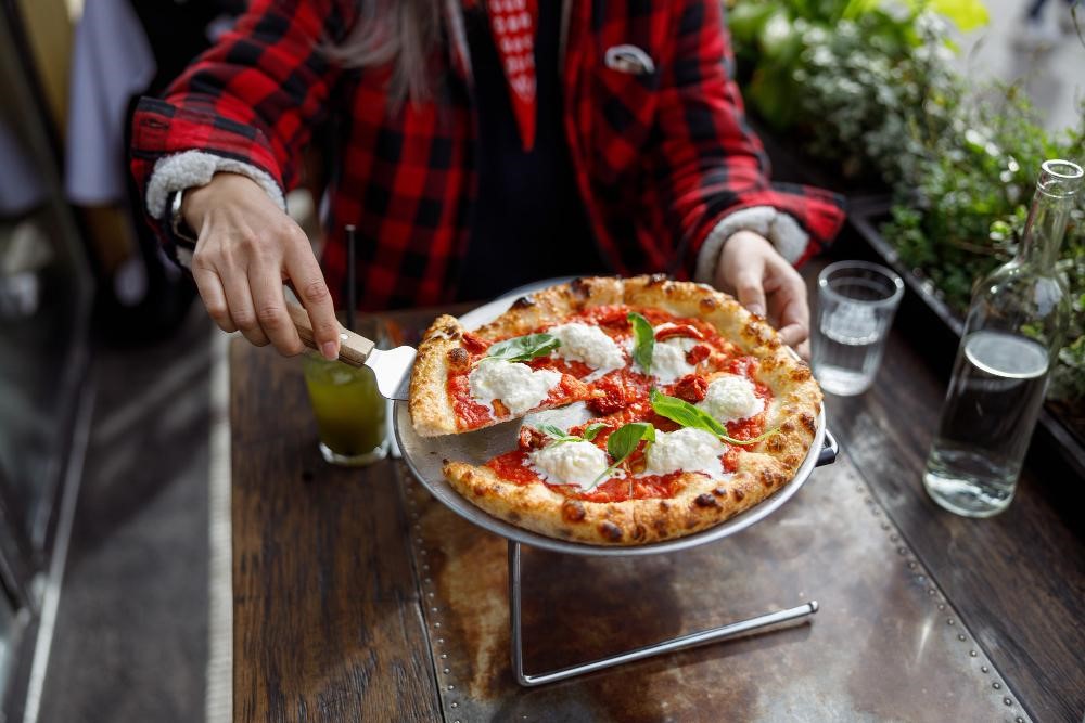 Eating Margherita pizza